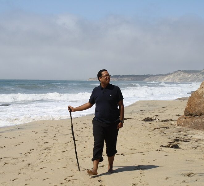 Josue walking at Lucy Vincent Beach